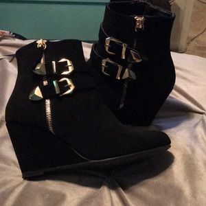 Gold buckled booties